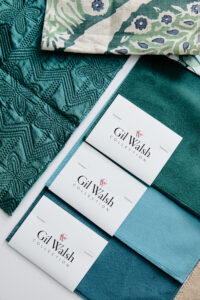 A selection of Gil Walsh Collection fabrics, in the blue family. Three solid fabrics in the blue color family, and two textured fabrics. 